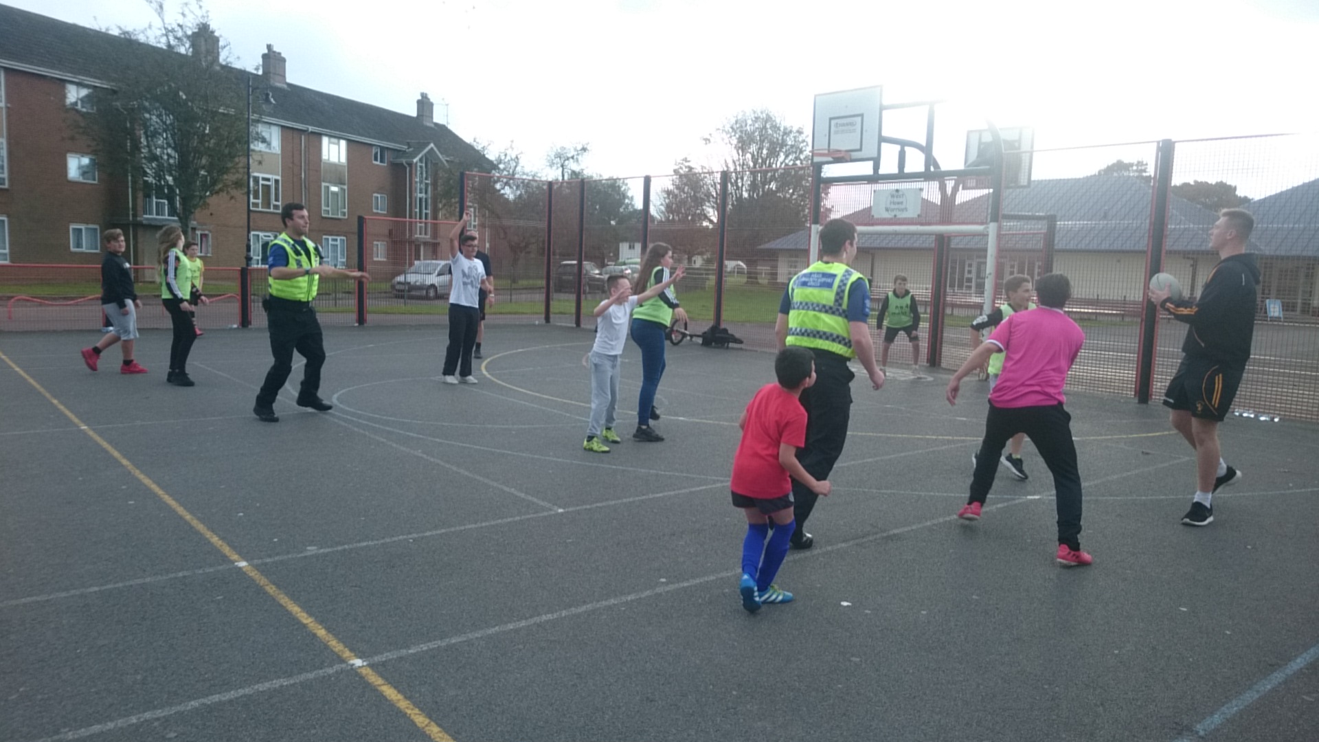 local police officers joining in games with children