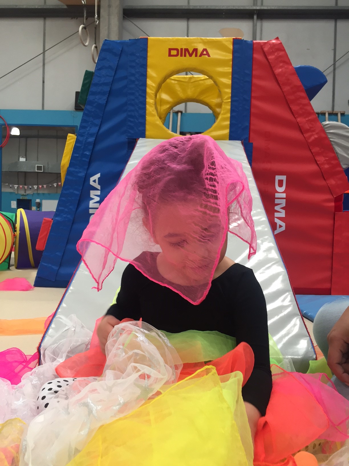 girl playing in soft play area