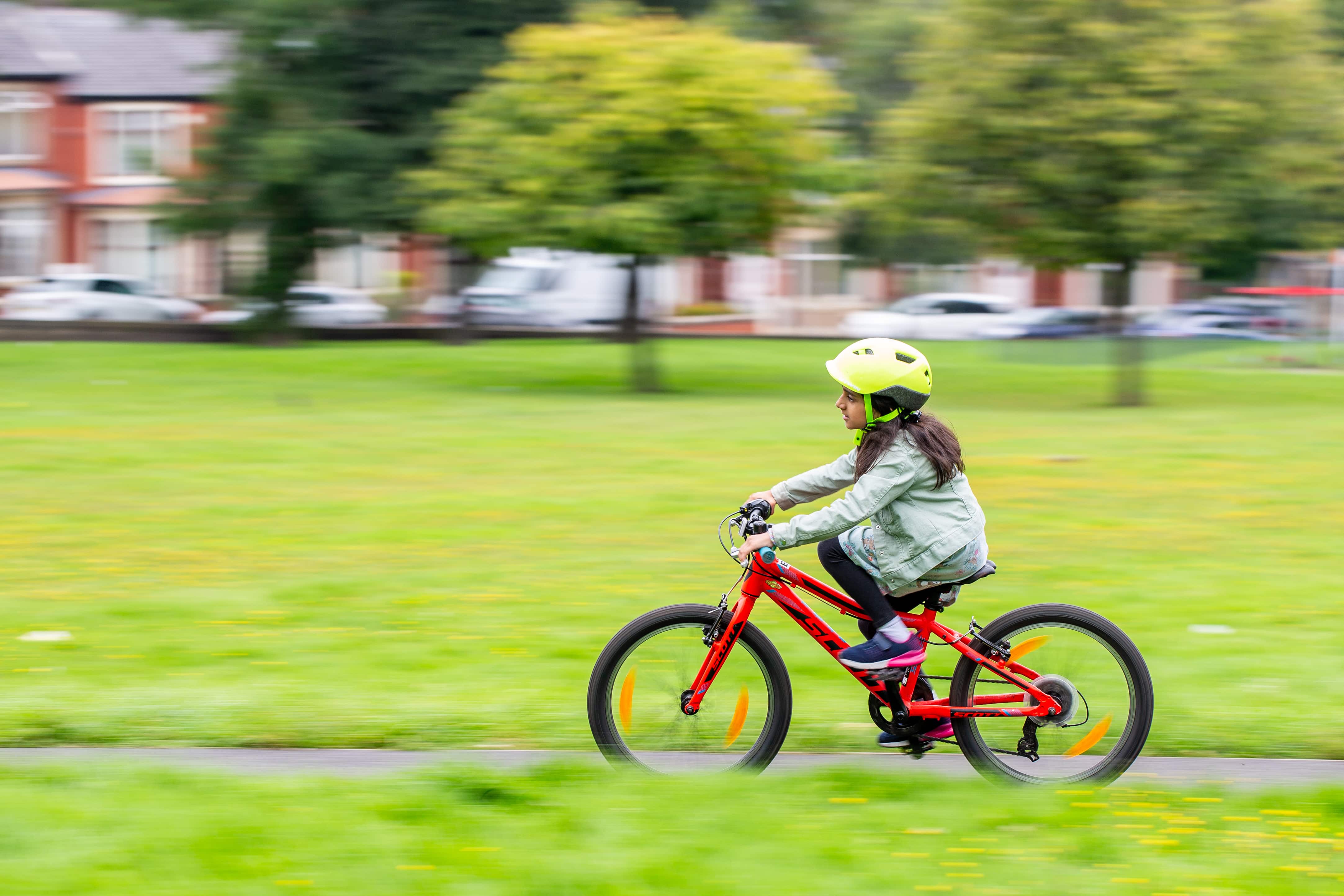 girl cycling through a bike