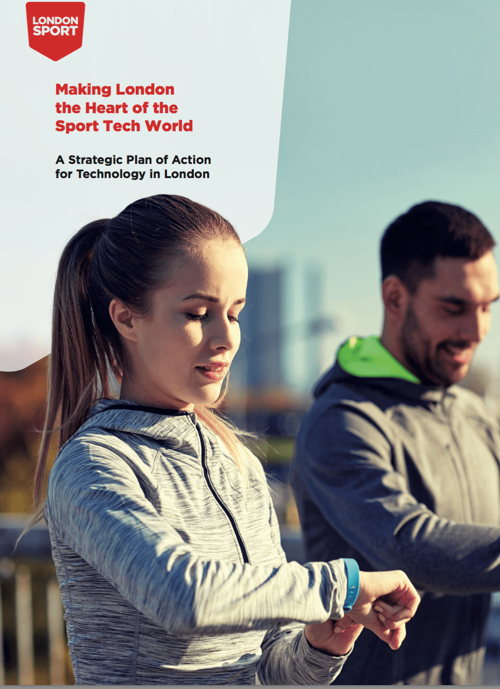 front cover of report showing two people looking at running watches