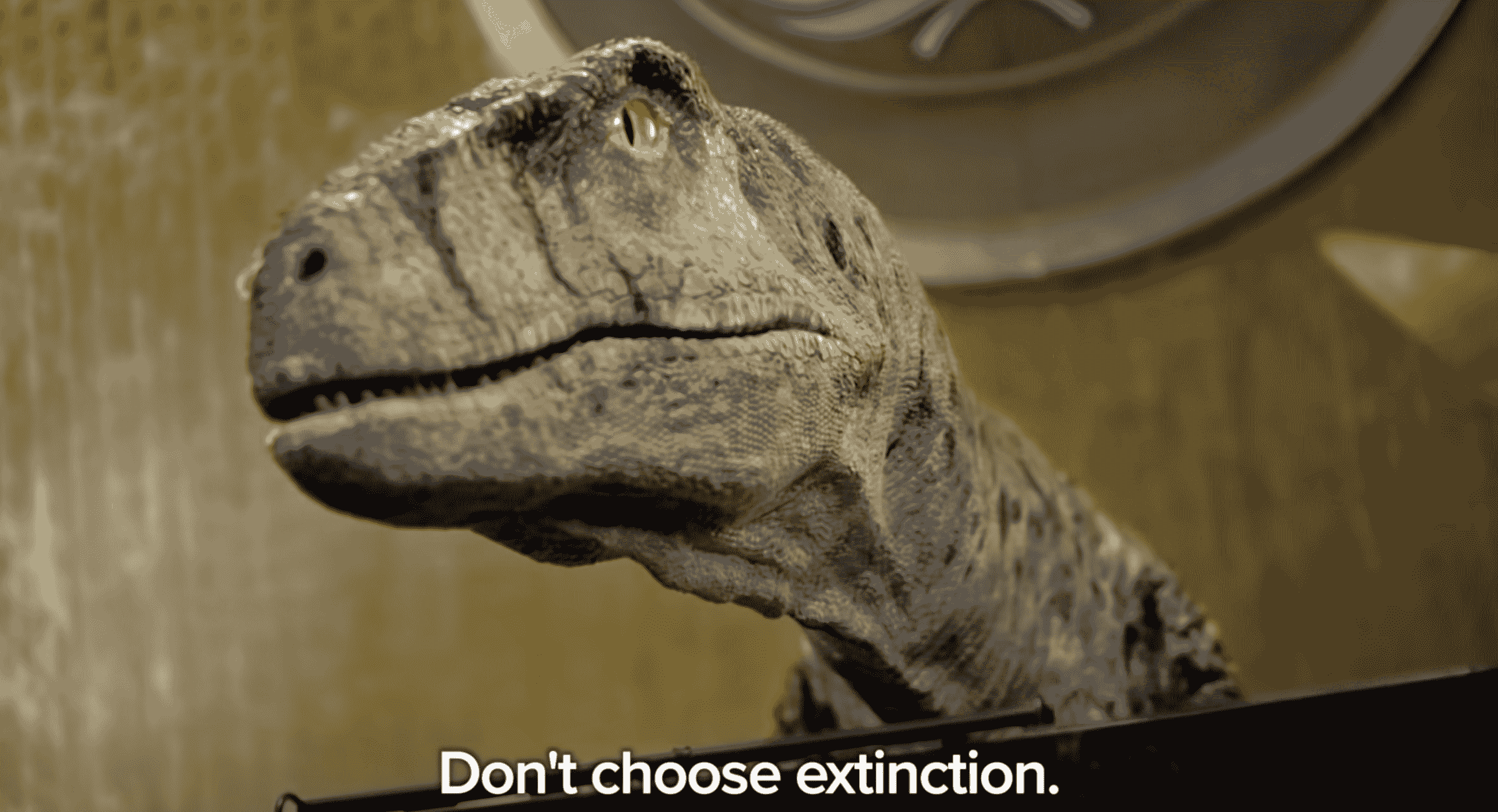 Dinosaur at a lecture telling the UN audience not to choose extinction  