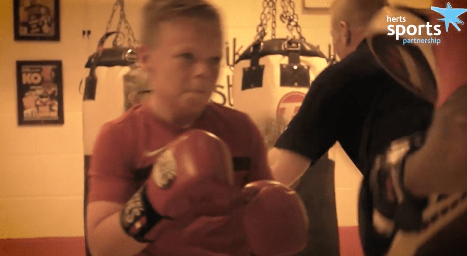 child taking part in boxing session