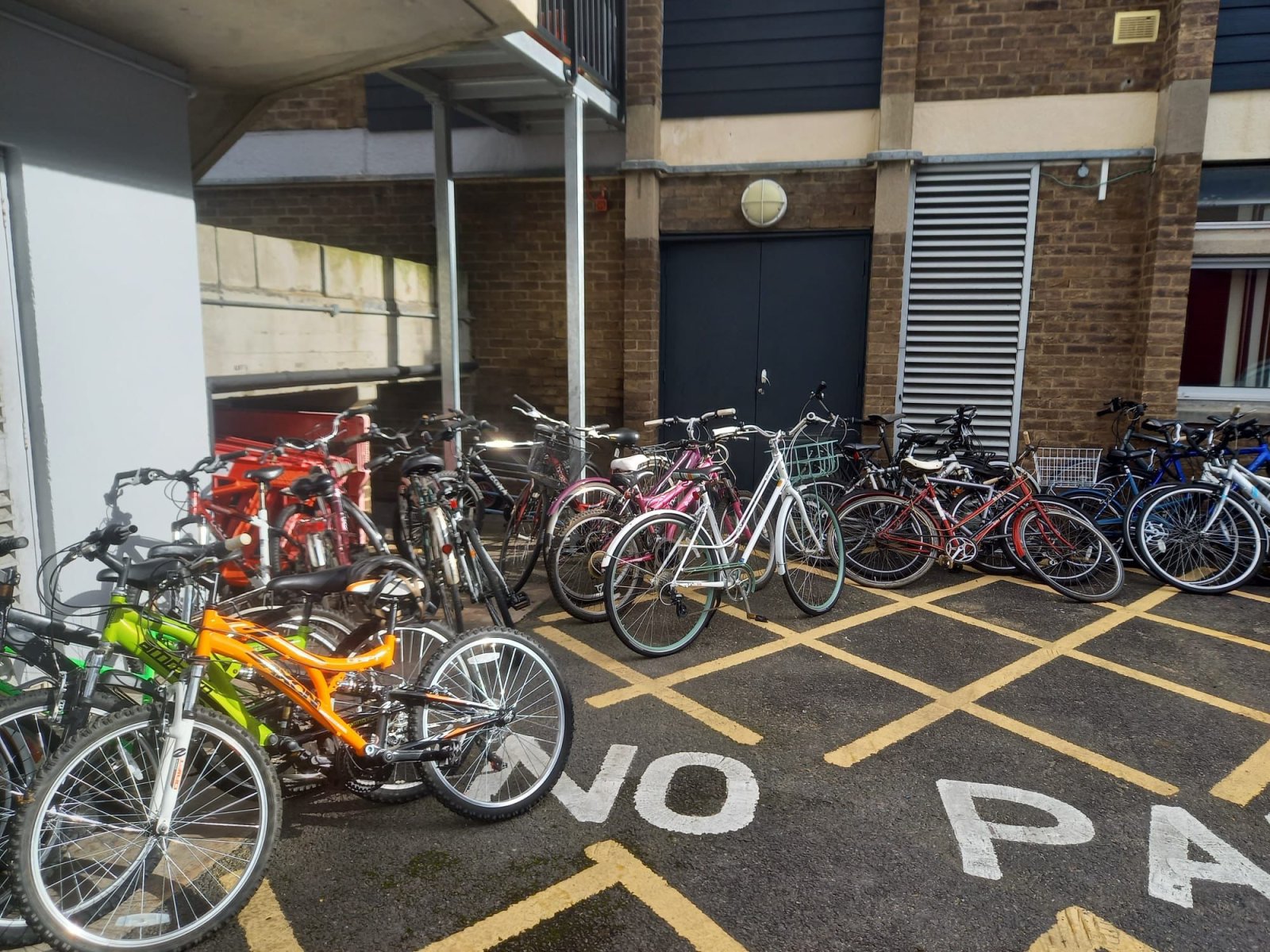 group of bikes outside a building