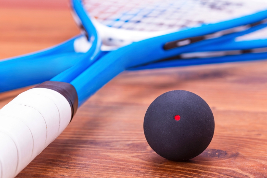 image of squash racket and ball