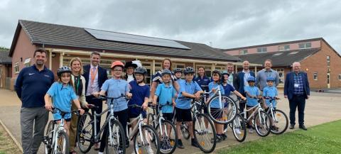 group of children on bikes in school playground