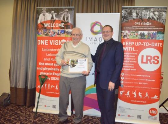 Frank Booth, oldest athlete award winner pictured with an Imago Venues representative
