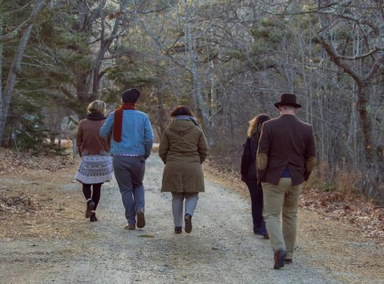 group walking through woods